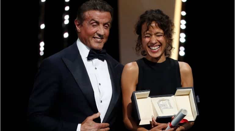 Director Mati Diop with actor Sylvester Stallone