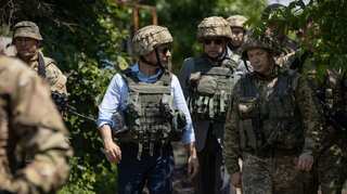 Ukraine's Volodymyr Zelensky visits rebel front line