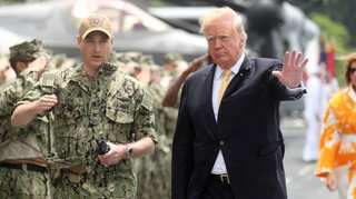 After visit, Trump expects Japan's military to reinforce United States in Asia and beyond