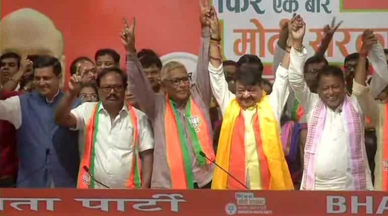 Setback for Mamata Banerjee: 2 Trinamool Congress MLAs, over 50 councillors join BJP Setback for Mamata Banerjee: 2 Trinamool Congress MLAs, over 50 councillors join BJP