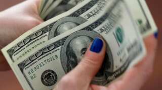 Businessman pays overdue utility bills for dozens of Floridians, again