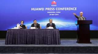 Huawei challenges US defence bill as sanctions fight ramps up