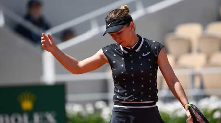 French Open: Defending champion Simona Halep's run ended by teenager Anisimova