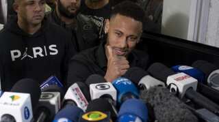 Brazil's Neymar records statement on wheelchair in Rio police station over rape accusation