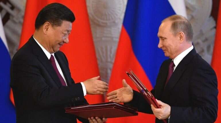Vladimir Putin, Xi Jinping hit back at US dominance at Russia economic forum