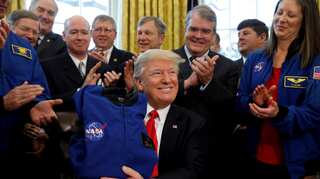 'They should be focused on much bigger things!' Trump criticises NASA moon mission