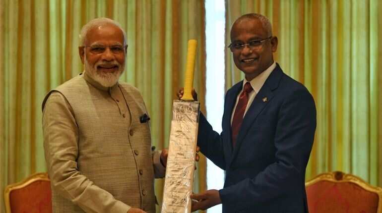Focus on cricket diplomacy as PM Modi gifts bat to Maldives President Solih Focus on cricket diplomacy as PM Modi gifts bat to Maldives President Solih