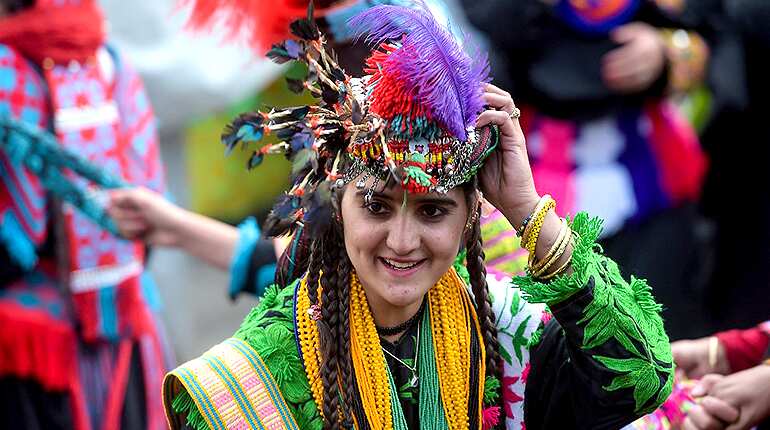 Pakistan's Kalash minority battles tourism deluge