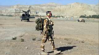 New Zealand to withdraw troops from Iraq next year, trim Afghanistan contingent