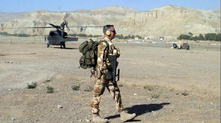 New Zealand to withdraw troops from Iraq next year, trim Afghanistan contingent
