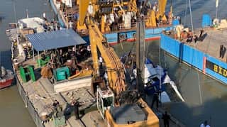Four bodies found as salvage crews lift capsized Hungarian boat