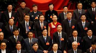 China says its Panchen Lama made first trip outside country in May