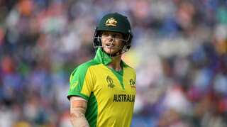 Australia's Steve Smith practises cover drives in shower