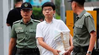 Hong Kong bars 12 prominent democracy activists from election