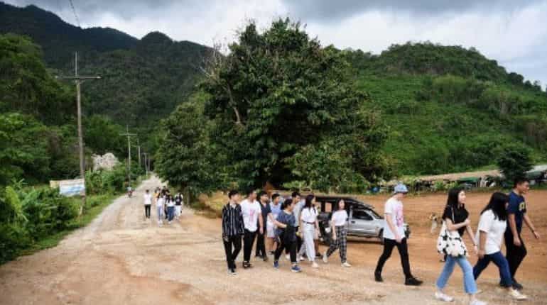 Tham Luang cave, inundated by Thai and foreign visitors