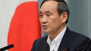 Japan PM urges better ties in call with South Korea's Moon