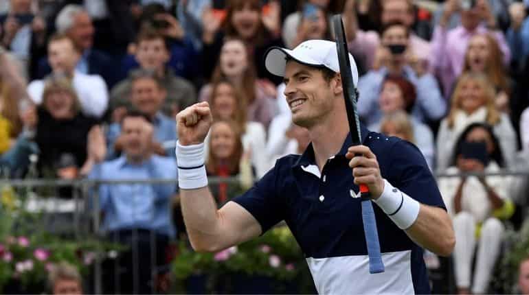 Andy Murray marks 'pain free' return with doubles win at Queen's Club Andy Murray marks 'pain free' return with doubles win at Queen's Club