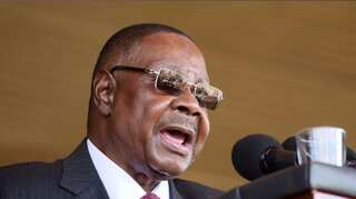 Malawi leader vows to lift economy as protests continue