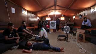 In border camps, Syrians rely on doctors in trucks and tents