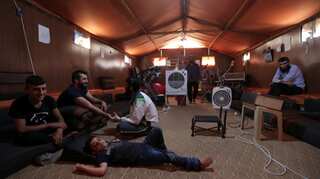 In border camps, Syrians rely on doctors in trucks and tents