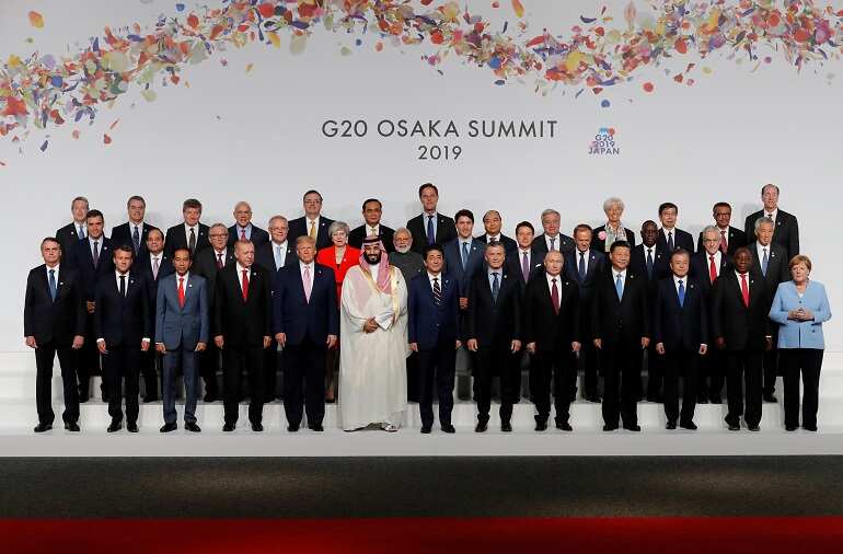 World leaders to hold crisis talks as virus toll tops 21,000
