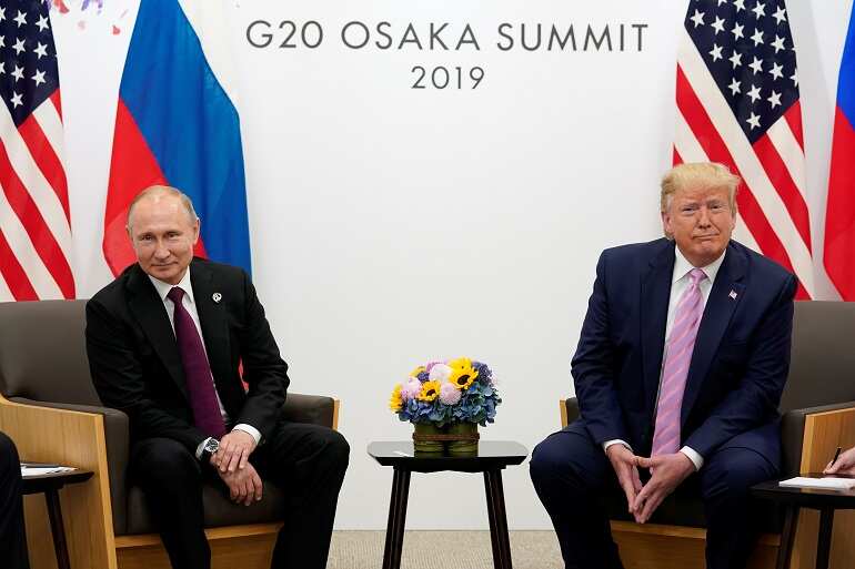 US President Trump tells Putin: Don't meddle in US elections