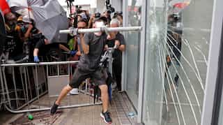 Protesters try to smash way into Hong Kong's Legislative Council