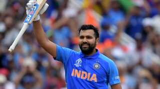 Rohit Sharma presents injured fan with yellow autographed hat after 'sixer ball' hit her