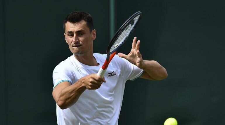 Wimbledon: Bernard Tomic fined for playing below standards Wimbledon: Bernard Tomic fined for playing below standards