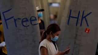 In a bid to keep up pressure on city's pro-Beijing leaders, Hong Kong protesters take aim at China station 