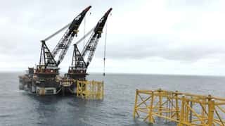 Oil rises after US Navy downs Iranian drone; set for weekly fall