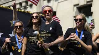 US World Cup winners feted with confetti, chants of 'equal pay'