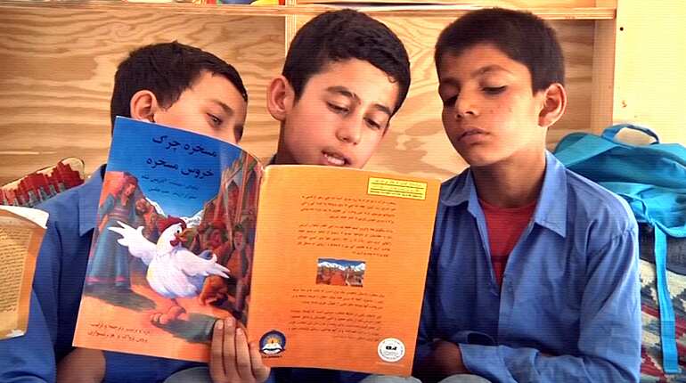Library bus brings books and dreams to Afghan children