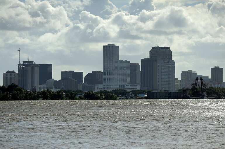 Barry churns off Louisiana, New Orleans storm surge lower than feared