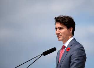 Canada's Trudeau slams rivals for dirty campaign, gets Obama endorsement