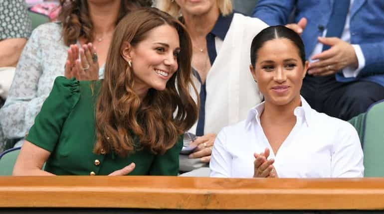Kate Middleton and Meghan Markle reportedly had a tiff over Princess Charlotte's outfit at the royal wedding