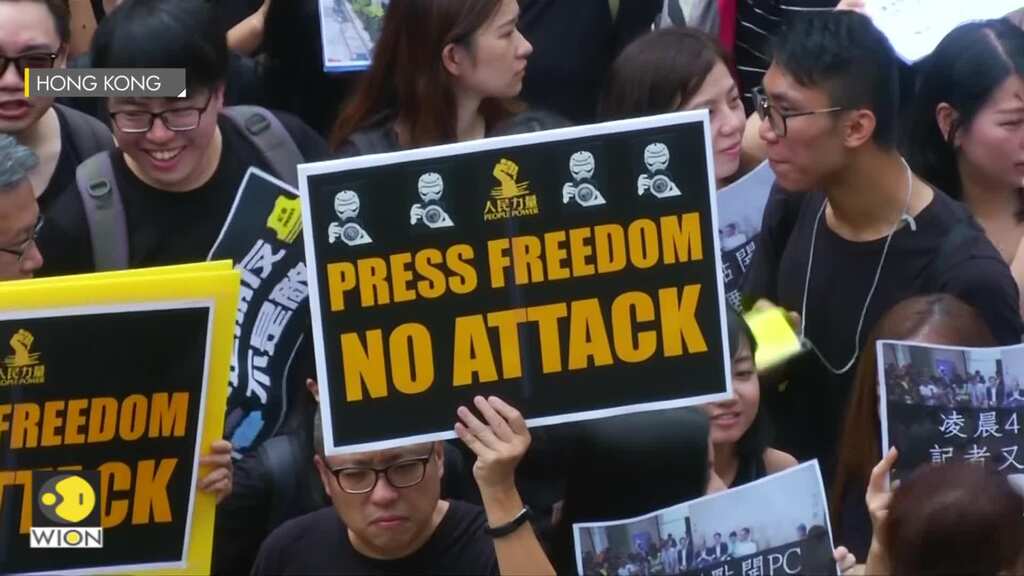Hong Kong reporters march against alleged police violence