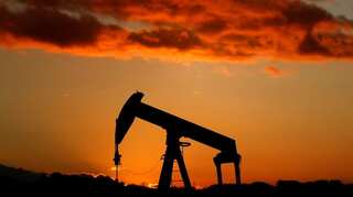 Oil steadies above $60 over OPEC supply cuts, global slowdown worries