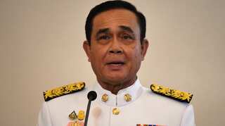 Thailand's Prime Minister Prayuth Chan-ocha refuses to quit; warns use of law