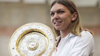 Wimbledon champion Simona Halep awarded with Romania's highest distinctions