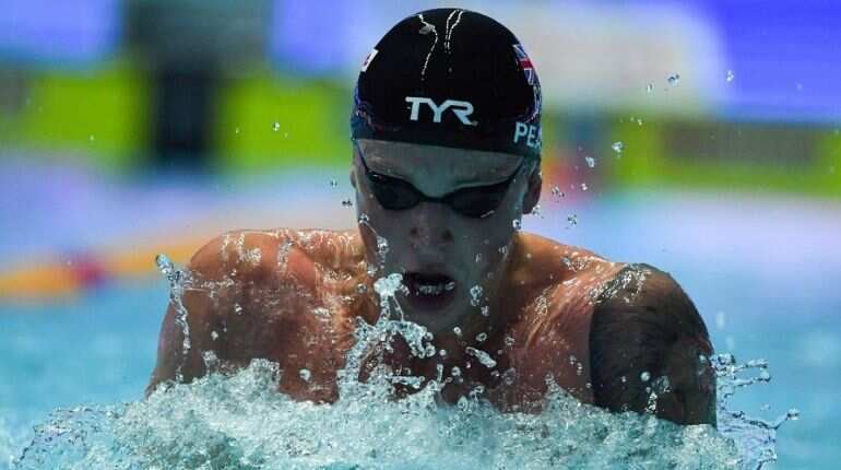 Britain's Adam Peaty crushes 100m breaststroke world record