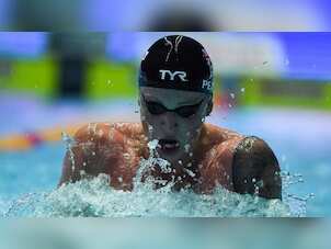 Britain's Adam Peaty crushes 100m breaststroke world record