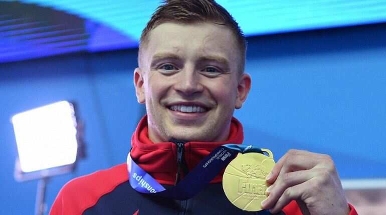 Britain's Adam Peaty completes world treble in men's 100m breaststroke Britain's Adam Peaty completes world treble in men's 100m breaststroke
