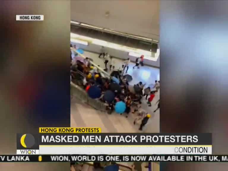 Masked men assault anti-government protesters in Hong Kong