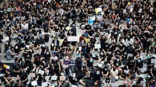 Hundred of protesters chanting 'free Hong Kong' converge on the Chinese-ruled city's airport