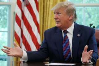 Outrage as Trump brands mostly-black Baltimore 'infested mess'