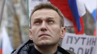 Russia's opposition figure Navalny who was poisoned now out of medically induced coma