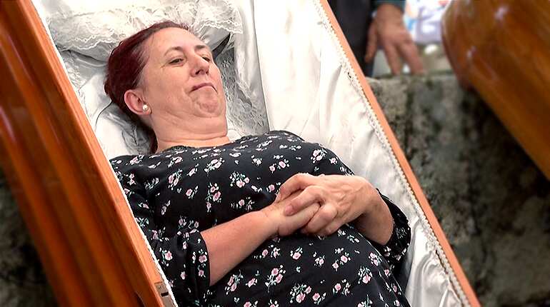Spanish survivors of 'near-death experiences' parade in coffins