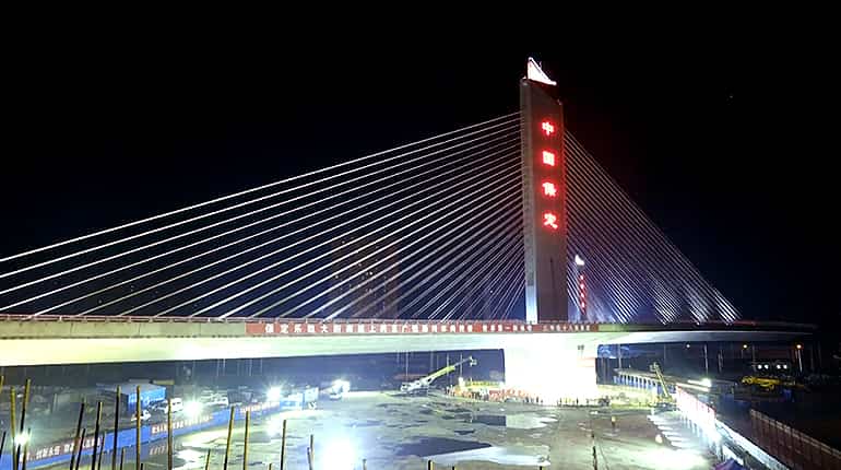World’s heaviest cable-stayed bridge rotates into position