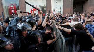 Russian police detain at least 94 including opposition leader Alexei Navalny at Moscow journalist protest